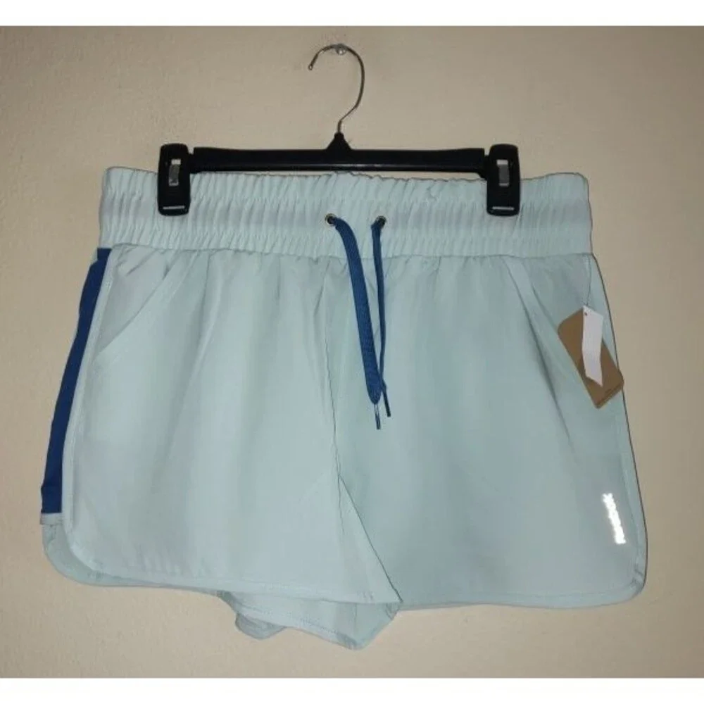 New with tags Women's Reebok Gym Workout Athletic Light Blue Shorts Size L / G